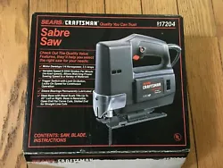 Older Sears Craftsman Sabre Saw Model 917204 - Box is worn - includes instructions and blades.