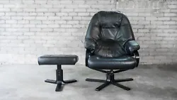 AIG Designs Model 17208 chair and ottoman in milan black, circa 1990s. Danish design, made in Denmark. Angled ottoman....