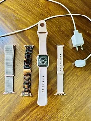 Apple Watch Series 4 40 mm Gold Aluminum Case with Pink Sand Sport Band and 3 extra bands. (GPS/Blue tooth) I have had...