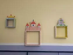Set of 3 Princess wall Shelves with 3D accents. They have hooks on back for easy hanging. Slight scratches on the...