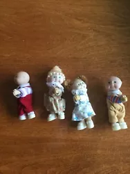 4 dolls 2 boys & 2 girls 4”