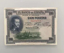 Billet Espagne 100 Ptas Bleu/vert du 01/07/1925 no F6,062,852. 1 pliure centrale verticale avec 1 fente en bas