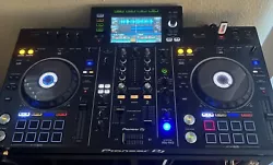 Pioneer DJ XDJ-RX2 All-in-One DJ System with Power Cord and Magma Case included. Screen is bright and easy to read....