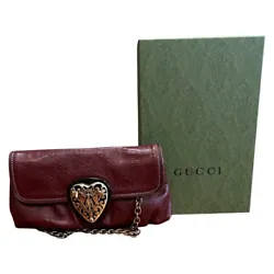 This is a rare and stunning Gucci Babouska shoulder bag in a beautiful red Guccissima leather pattern. The exterior of...