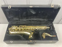 This is a used Conn 16M tenor saxophone in good playing condition. The serial number dates it to 1960. There is wear...