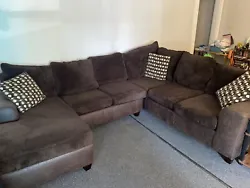 Wrap around couch. Damage is pictured