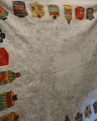 This vintage Startex tablecloth features a beautiful floral pattern in primary colors, with apothecary jars as the main...