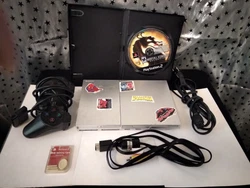 Ps2 slim Silver Console with memory card, 1 controller, and cords. Also included is Mortal kombat deception game. Ready...