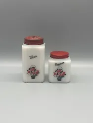 Tipp City McKee Milk Glass Pepper & Flour Shakers Black & Red Flower Basket. Vintage condition, lids are in fair...