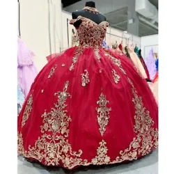 Make a grand entrance at your next formal event with this stunning red ball gown. The off-the-shoulder neckline and...