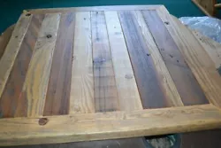 You are looking at a beautifully hand made barn wood table top.