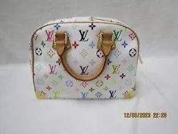 Louis Vuitton White Monogram Trouville, pre owned in great condition.