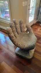 Gray faux granite plastic hand chair.