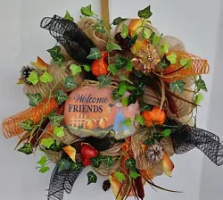 With Leaves, Gourds, Pine cones, etc. Assorted scarecrow, gourds, pine cones, leaves, ribbons, and bows. This is a...