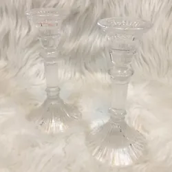 Great condition! Clear glass candlestick holders. fluted / ribbed texture from top to bottom. totally classic and...