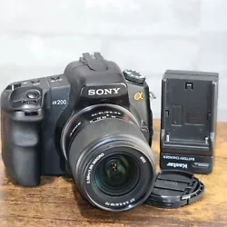 Used-good condition with A200 body, 18-70mm lens, replacement battery, replacement charger ONLY. no cables or CF memory...