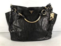 Fair pre-owned condition. This bag shows heavy wear from previous use. Heavy scratches and scuffs to the exterior...