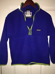 Patagonia Kids 1/4 Zip Fleece Blue M (10). Condition is Pre-owned. Shipped with USPS First Class Package.Small stain on...