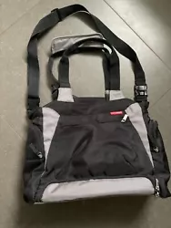 Great diaper bag with lots of pockets/storage on inside and side of bag.