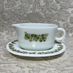 The set includes a green oval-shaped gravy boat and a matching under plate, both adorned with the iconic Crazy Daisy...