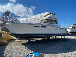 Project boat!!! Boat has been sitting for years. Engines are out on pallets. One is blown but have a replacement. Has a...