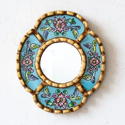 This vanity oval hanging mirror ”cuzcaja” blend the styles of Peruvian Reverse Painting on Glass. Oval Mirror Wall...