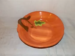 Stoneware, pumpkin shaped, baking, deep dish, serving dish/pie plate. The serving dish/pie plate is marked: 