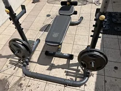 Golds Gym XRS 20 Olympic Workout Rack - USED. Bench and rack are totally usable but have been outside so there is some...