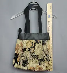 1 storage areas within bag with a zipper to close. Bag Width Bag Height Strap Drop: 11 in. Bag Depth.