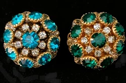 This set has 2 petite half inch dome pin/brooches. They are prong set crystals and one has vibrant blue rhinestones...