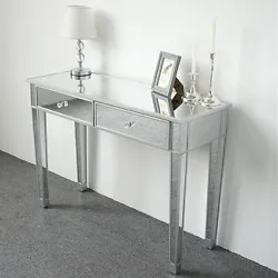 This is our 2 drawers glass mirrored makeup table, which has a beautiful appearance. With its mirrored finish, it...