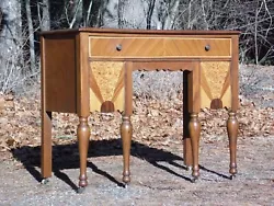 Walnut wood with beveled top edge and raised on long bulbous turned legs at the front, c. 1930-40s. On castors for easy...