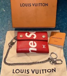 Louis Vuitton x Supreme Red EPI Chain Wallet in original box comes with a Certificate of Authentication (100% Authentic)