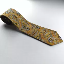 Woodward & Lothrop wide tie in yellow paisley print. 100% polyester.
