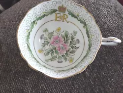 I have one Paragon Commemorative Queen Elizabeth II BONE China tea cup.  It is very pretty and in perfect condition. ...