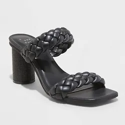 •3.25in basil heel for a dramatic look •Features two bands with woven design for a chic look •Solid black sandals...