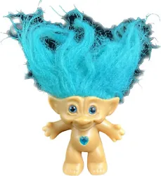 This TROLL doll from ACE Novelty Co. is a charming addition to any collection. With aqua hair and blue eyes, the dolls...