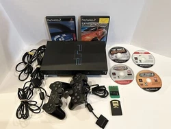 Get your hands on this amazing bundle that includes a Sony PlayStation 2 Fat Console, 6 games, 2 controllers, and 2...