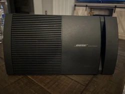 Bose Black Rectangle Shape Wired Surround Sound Speaker. Condition is Used. Shipped with USPS Priority Mail.