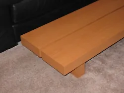 Unique custom-made low Asian-style coffee table in excellent preowned condition. Table is constructed of a wood-grain...