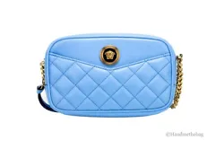 Features: Adjustable Chain Accented Crossbody Strap, Inner card Pocket, Zip Closure, Outer Slip Pocket, Fabric Lined....