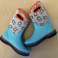 Bogs boots snow rain winter penguin design. Shows some wear and use- minor tread wear