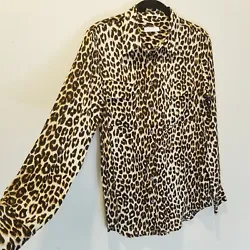 Leopard Print. Button Up shirt. 2 front chest pockets. length, shoulder to hem 27.5