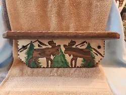 Handcrafted wooden wall shelf with moose and tree design, perfect for cabins, lodges, and other areas of rustic...