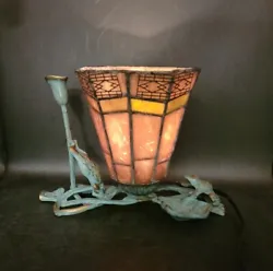 This unique desk lamp features a fun and funky design of brass frogs jumping on a lily pad. This original piece is...