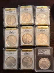 Eight of the nine are still wrapped in the original cellophane. Most have attractive rim toning, front and back/obverse...