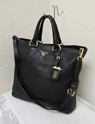Materials: pebbled leather and nylon lining. Pre owned PRADA Handbag Shoulder Bag. 100% AUTHENTIC. Bottom and corners:...