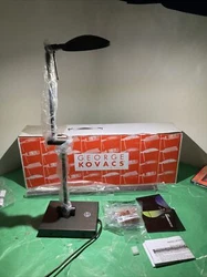 Featuring an adjustable arm and light sensor technology, this lamp is perfect for any desk or workspace. Plastic still...
