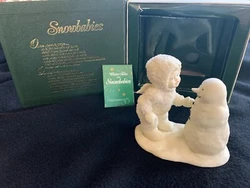 Adorable Snowbaby and snowman.  Model 6801-2, created in early 1990s.  Small in size so perfect for display on a...