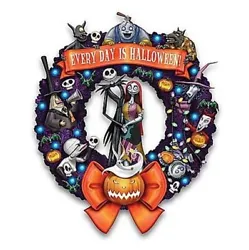 This Disney Tim Burtons The Nightmare Before Christmas Halloween wreath from The Hamilton Collection features Tim...